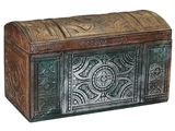 a wooden chest with a decorative design on the front