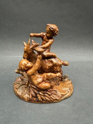 D'après CLODION. Sculpture en métal patiné représentant une …