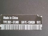 a close up of a label on the side of a laptop computer