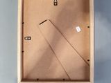 a clock that is on the wall in a box