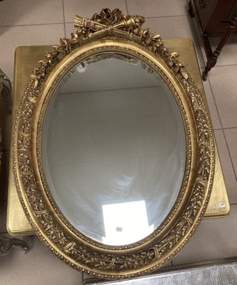 a mirror that is sitting on the floor next to a mirror