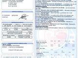 un gros plan d'une feuille de papier sur laquelle figure l'image d'un avion