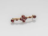 an image of a pair of garnets on a white surface