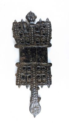 an image of a metal cross on a white background