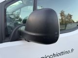 a side view mirror of a white truck with a logo on it