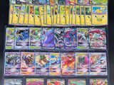 a large collection of pokemon cards are displayed on a table