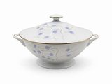 an image of a white bowl with blue flowers on it