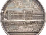 une image représentant une médaille d'argent sur laquelle figure l'image d'un bâtiment