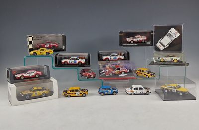 a lot of toy cars that are in a display case
