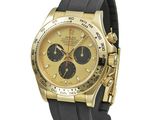 yellow gold rolex daytonax watch with black rubber strap