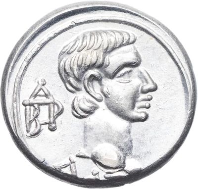 l'image d'une pièce d'argent sur laquelle figure le visage d'un homme
