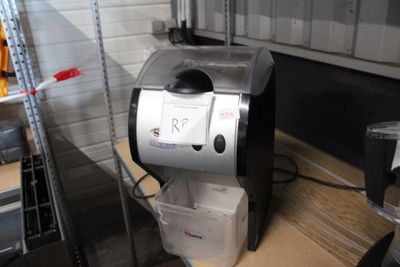 a coffee maker that is sitting on a table