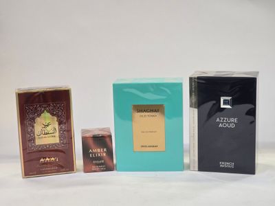three different types of perfumes are displayed on a white surface