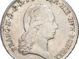 a close up of a coin with a woman ' s head on it
