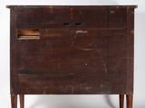an old wooden dresser with a drawer on top of it