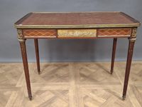 Table à écrire en bois plaqué à décor marqueté rehaussé d'él… (photo 5)