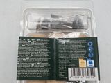 a close up of a package of screws on a white surface