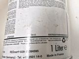 a can of paint that is sitting on a table