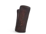 an image of a brown leather case with a small hole in it