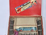 a box with a toy train in it on a table