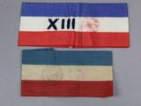 two pieces of cloth with different colors on them on a table