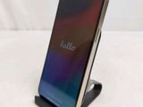 a cell phone that is sitting on a stand