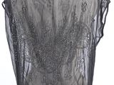 an image of a black dress on a hanger on a white wall