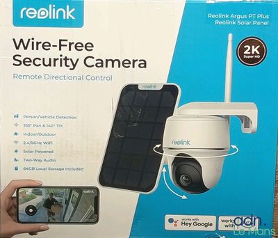 emballage d'une caméra de sécurité sans fil représentant une main tenant un téléphone portable