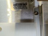 a close up of a piece of metal with a label on it
