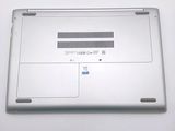 a laptop that is sitting on a white table