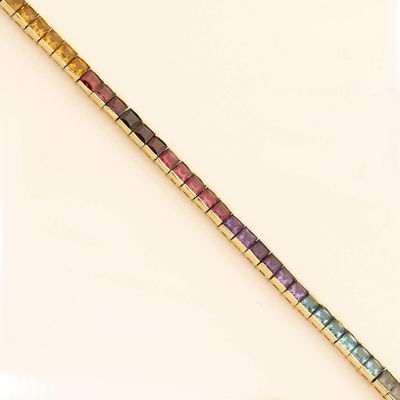 bracelet with multi colored stones on a white background