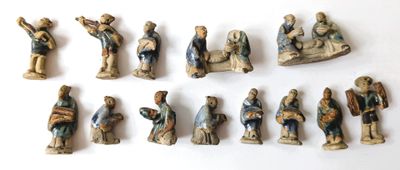 many figurines of different sizes and shapes on the table