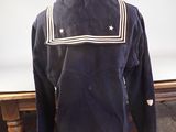navy blue jacket with white stars on the collar and sleeves