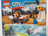 une boîte contenant un ensemble Lego City