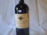 a bottle of wine that is sitting on a table