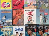 a lot of books that are sitting on the floor