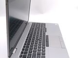 a close up of a laptop computer on a white surface