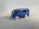 a blue toy bus that is sitting on a table
