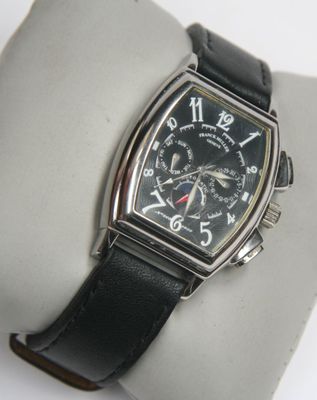 an image of a wrist watch with a black dial