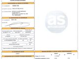 un gros plan d'un document sur lequel figure la photo d'une voiture