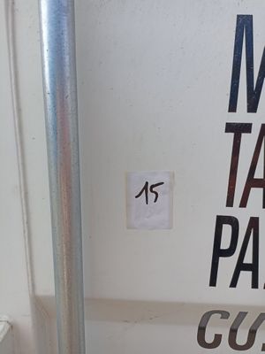 a sign on the side of a bus that says make a take on parking