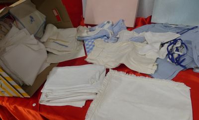 a box of cloths on a table with a box of cloths