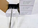 a box of drill bits sitting on a table next to a box of drill bits