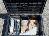 a black case with a bunch of items inside of it