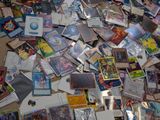 many different types of cards scattered on the floor