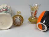 three vases sitting next to each other on a table