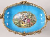 a blue bowl with a picture of a woman and a child on it