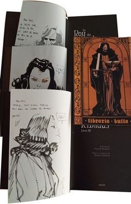 a book with a drawing of a woman and a drawing of a man