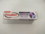a box of poldent maximum control toothpaste on a table