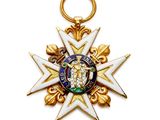 Gros plan sur une médaille ornée d'une croix